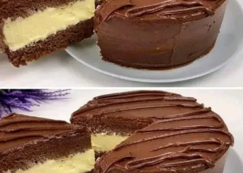 Klassischer Schichtkuchen mit cremigem Zuckerguss